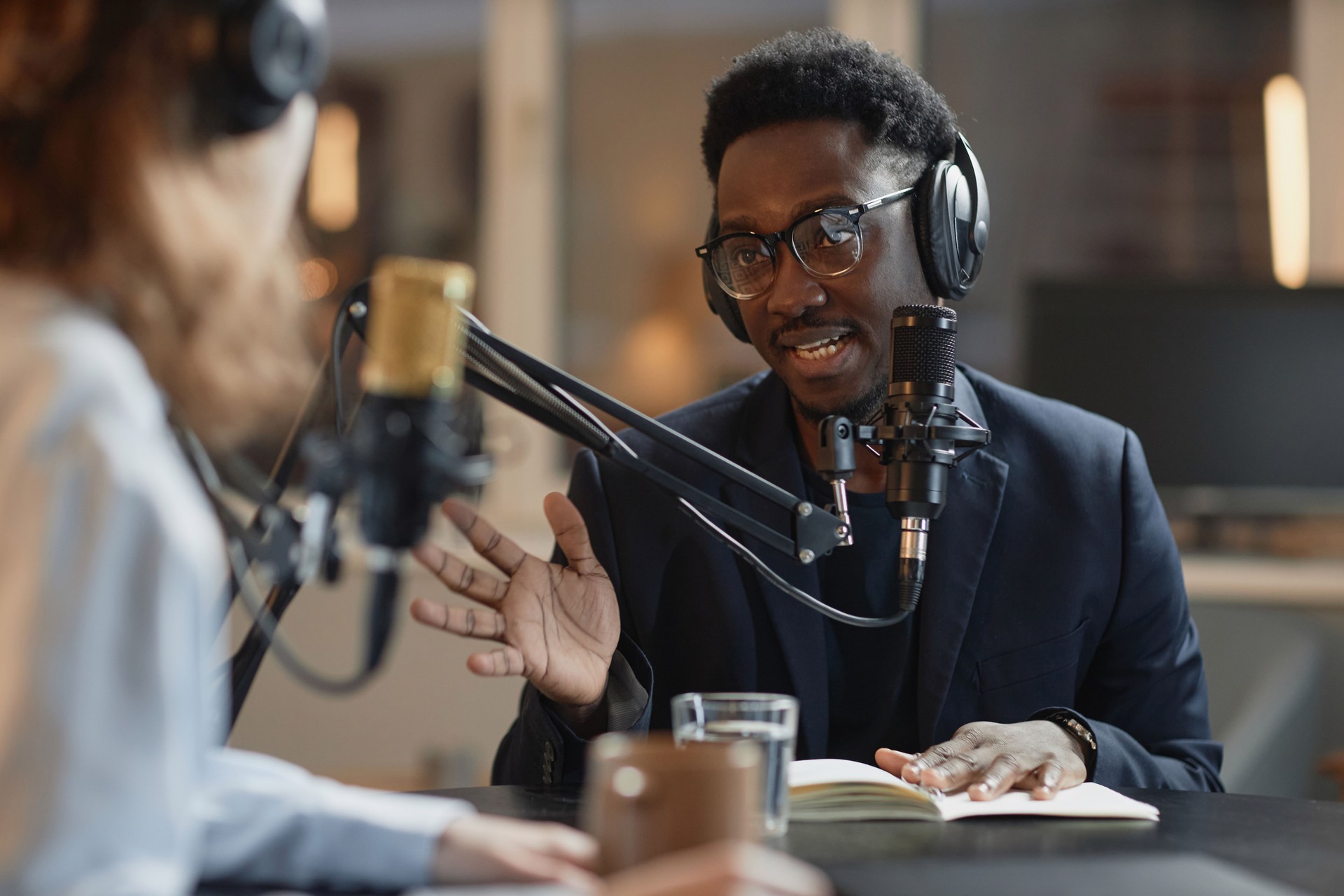 Man Responding to Interviewer at Podcast